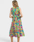 Woman wearing a colorful dress with a white background