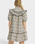 Patterned dress with a hood on a white background