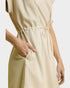 Beige dress with a drawstring waist on a white background