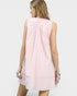 Woman wearing a pink and white striped dress on a white background