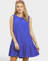 Woman wearing a blue dress on a white background