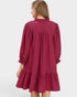 Red dress with long sleeves and a ruffled skirt on a white background