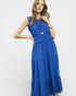 Woman wearing a blue dress on a white background