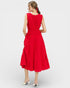 Woman wearing a red dress on a white background