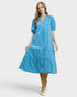 Woman wearing a blue dress on a white background
