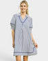 Woman wearing a blue and white striped dress with a collar on a white background