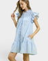Woman wearing a light blue striped dress with ruffled sleeves on a white background
