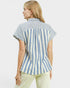 Woman wearing a blue and white striped shirt on a light gray background