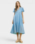Woman wearing a blue dress on a white background