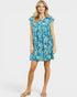 Woman wearing a blue floral dress on a white background