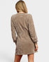 Beige velvet dress worn by a person on a white background
