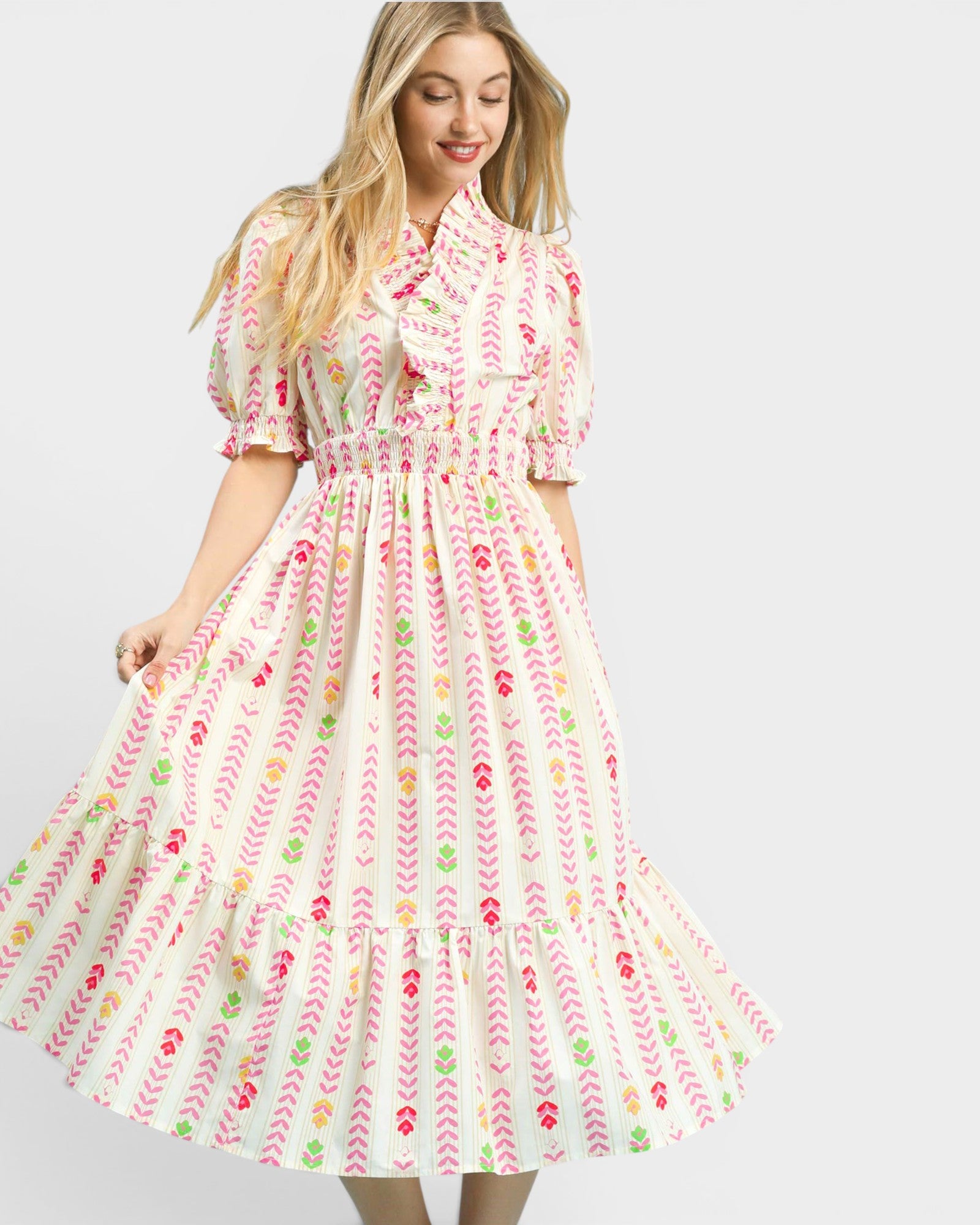 Woman wearing a floral dress on a white background