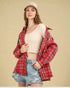 Chemise à carreaux contrastés rouges avec coutures brutes