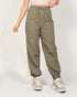 Person wearing olive green pants on a white background
