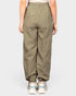 Person wearing olive green pants on a white background
