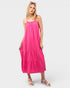Woman wearing a pink dress on a white background