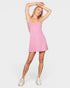 Woman wearing a pink dress on a white background