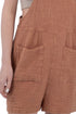 Brown checkered shorts with pockets on a plain background