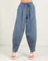 Blue wide-leg pants worn by a person on a white background