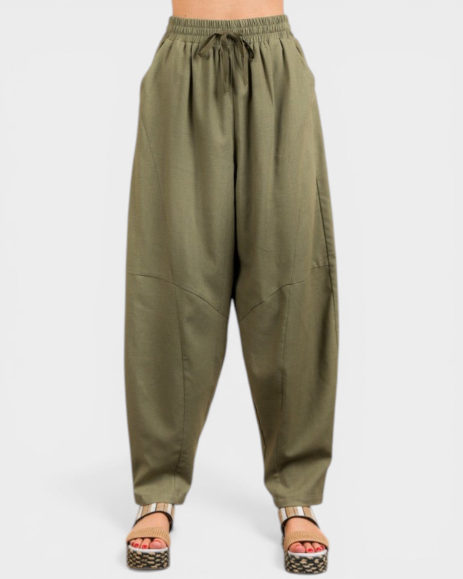 Green baggy pants on a white background