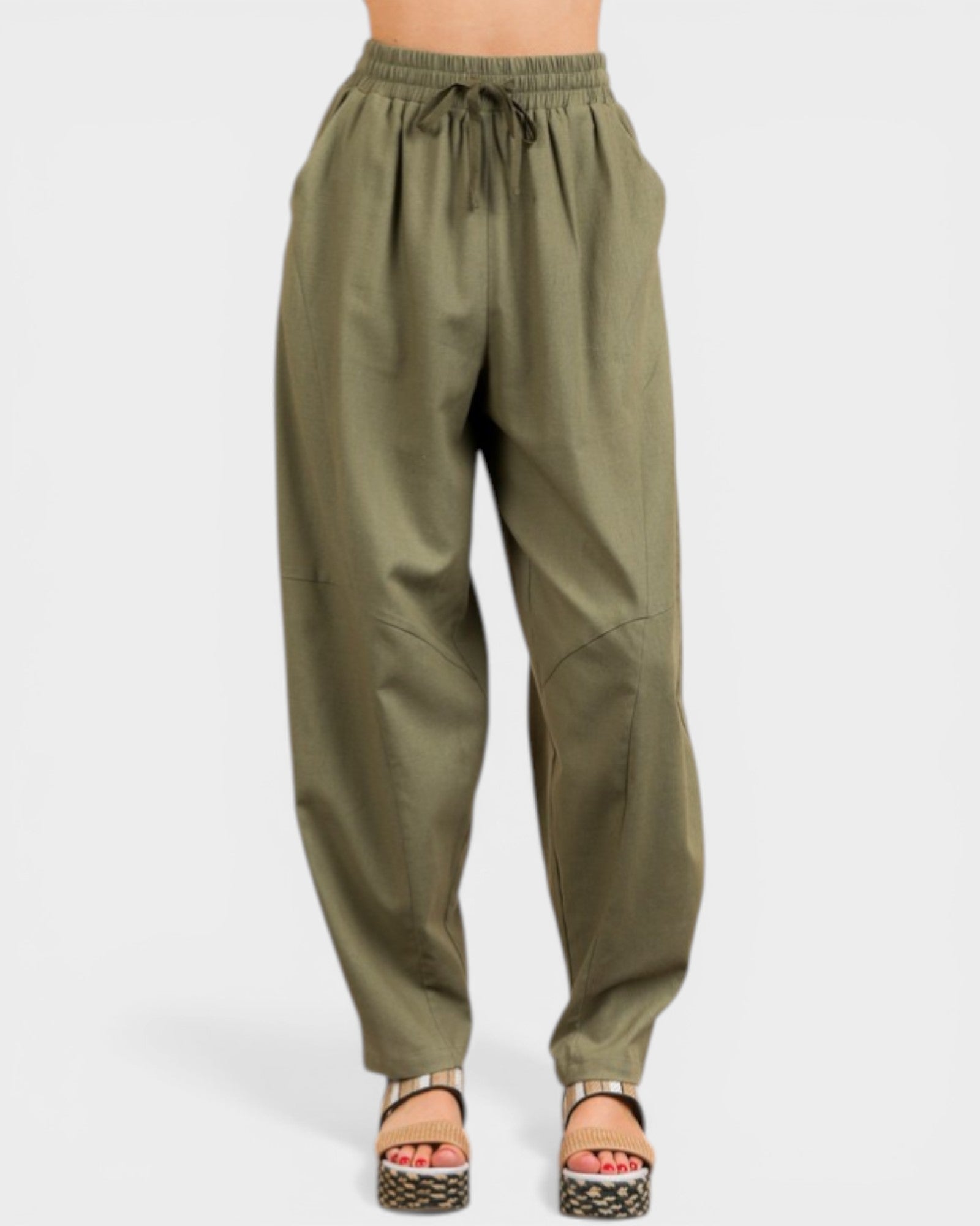 Olive green pants on a white background