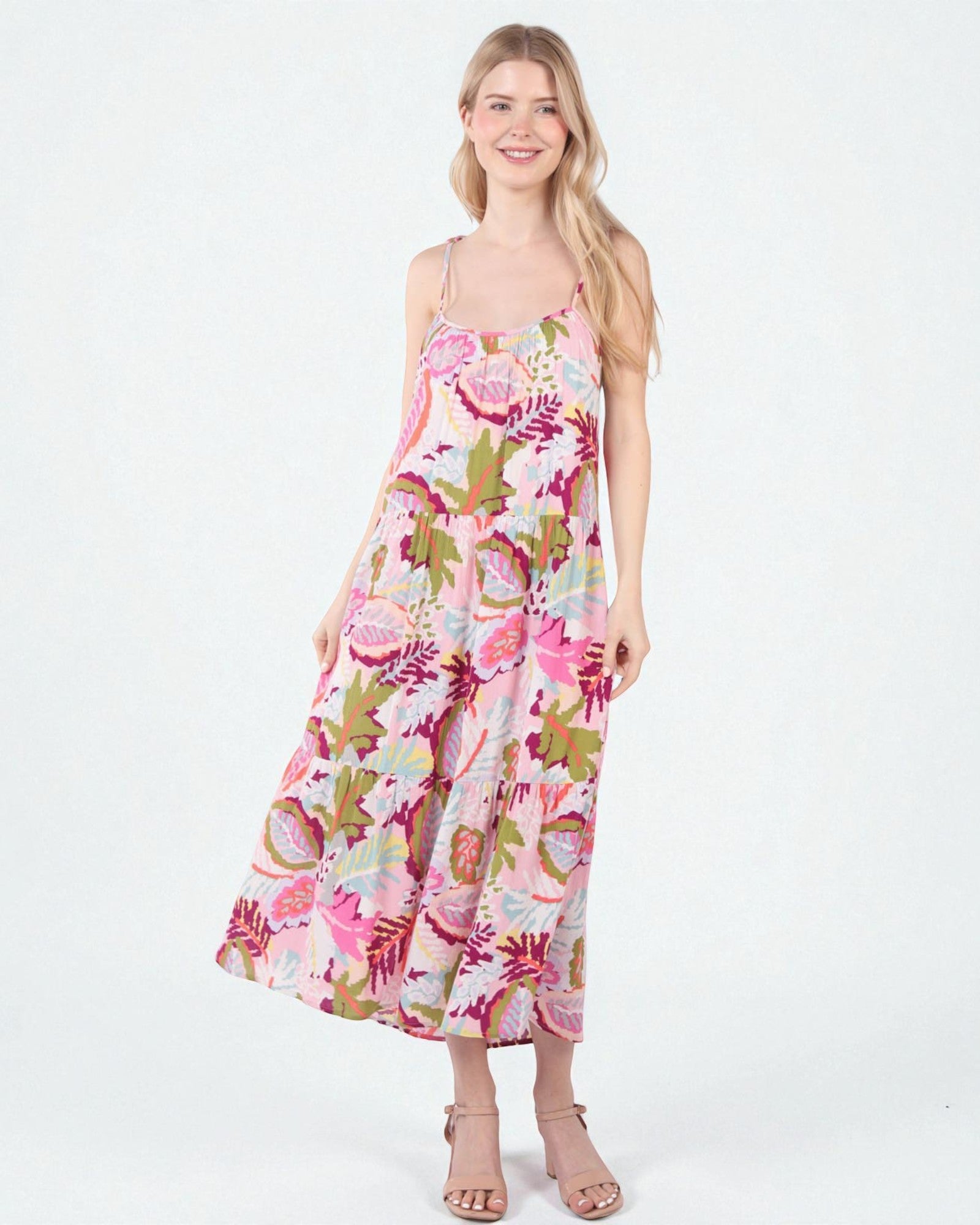 Woman wearing a floral dress on a white background