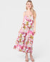 Woman wearing a floral dress on a white background