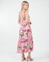 Woman wearing a floral dress on a white background