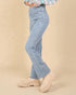 Legging taille croisée en denim délavé en indigo clair