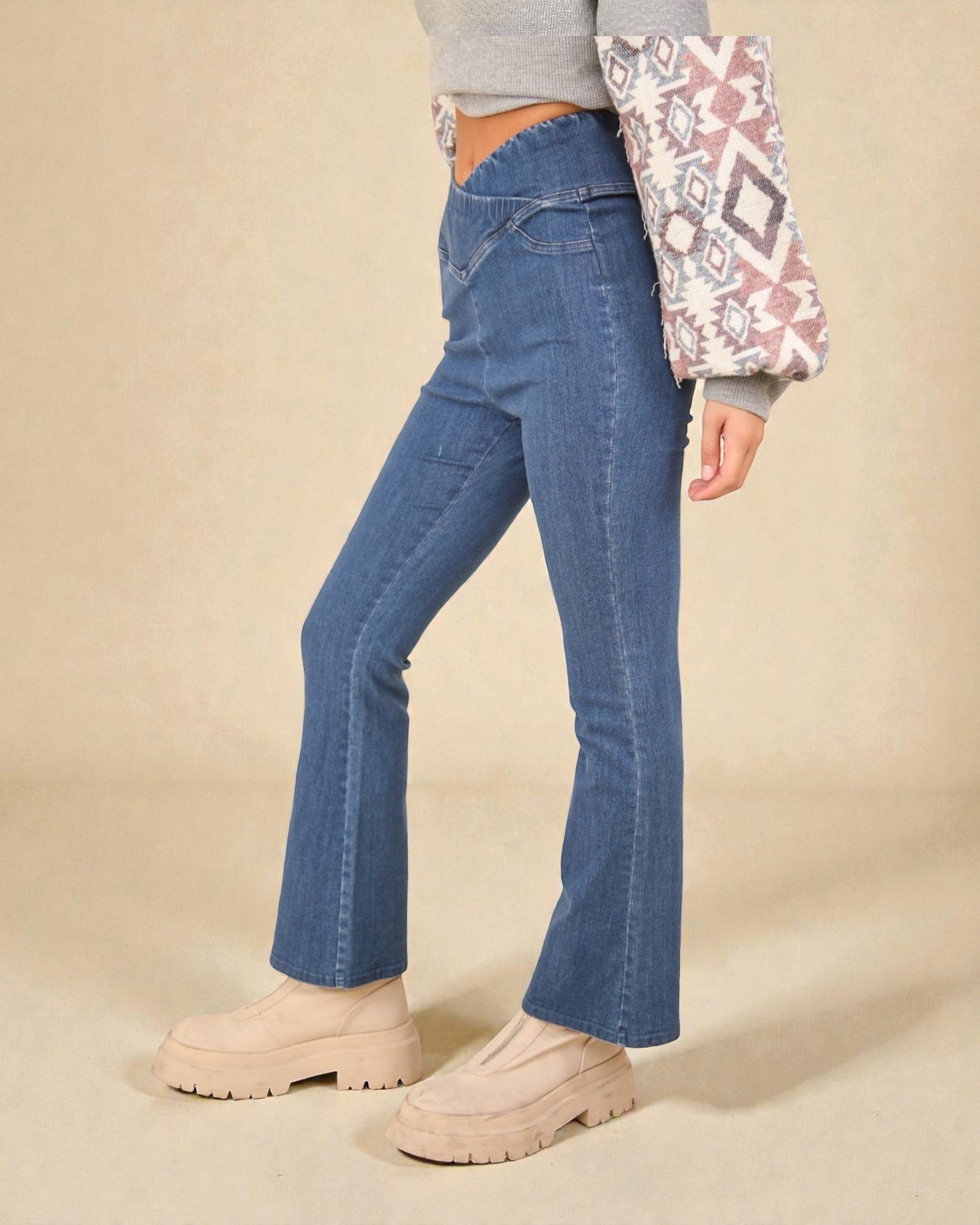 Legging taille croisée en denim délavé en indigo