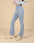 Legging taille croisée en denim délavé en indigo clair
