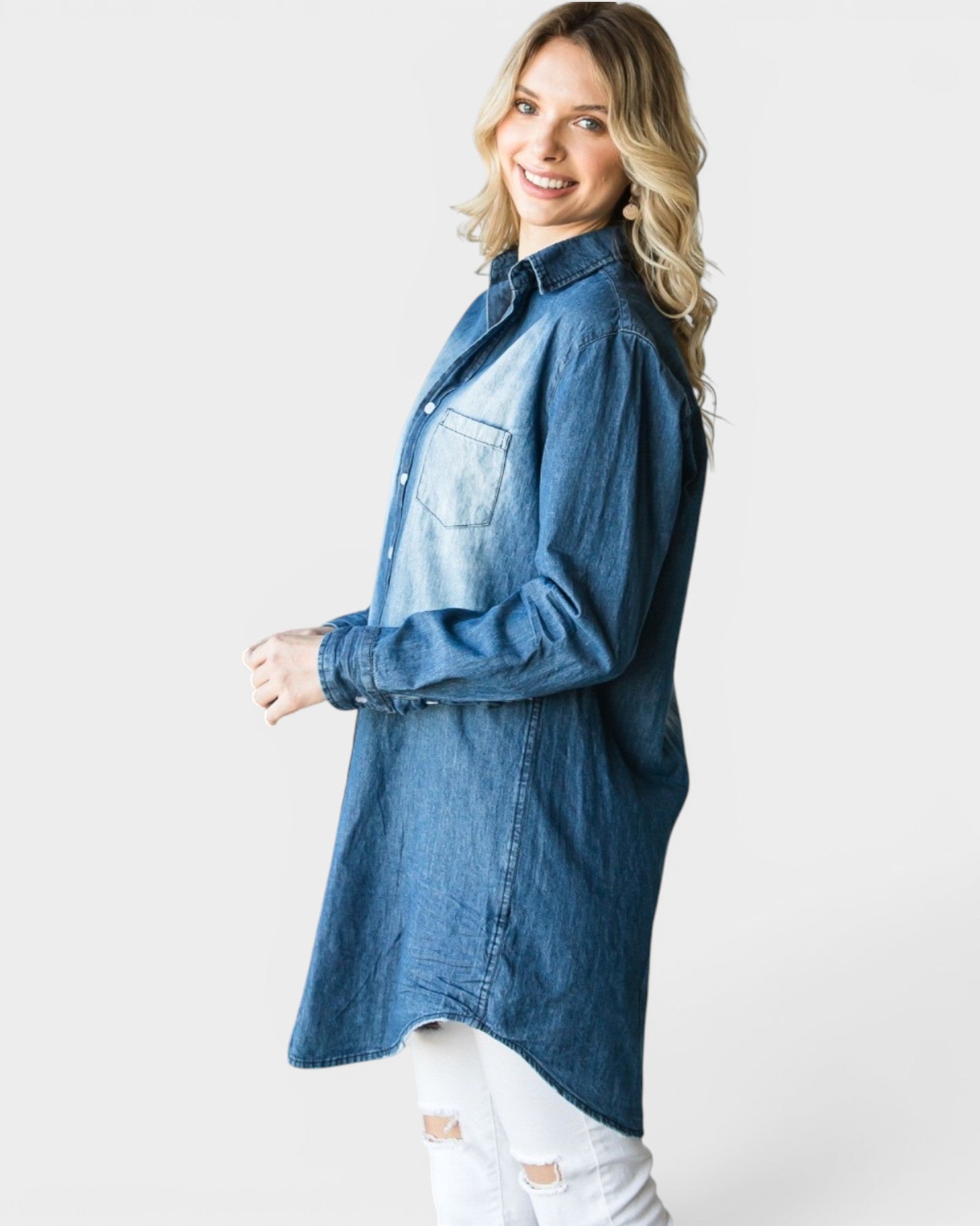 Woman wearing a blue denim shirt on a white background