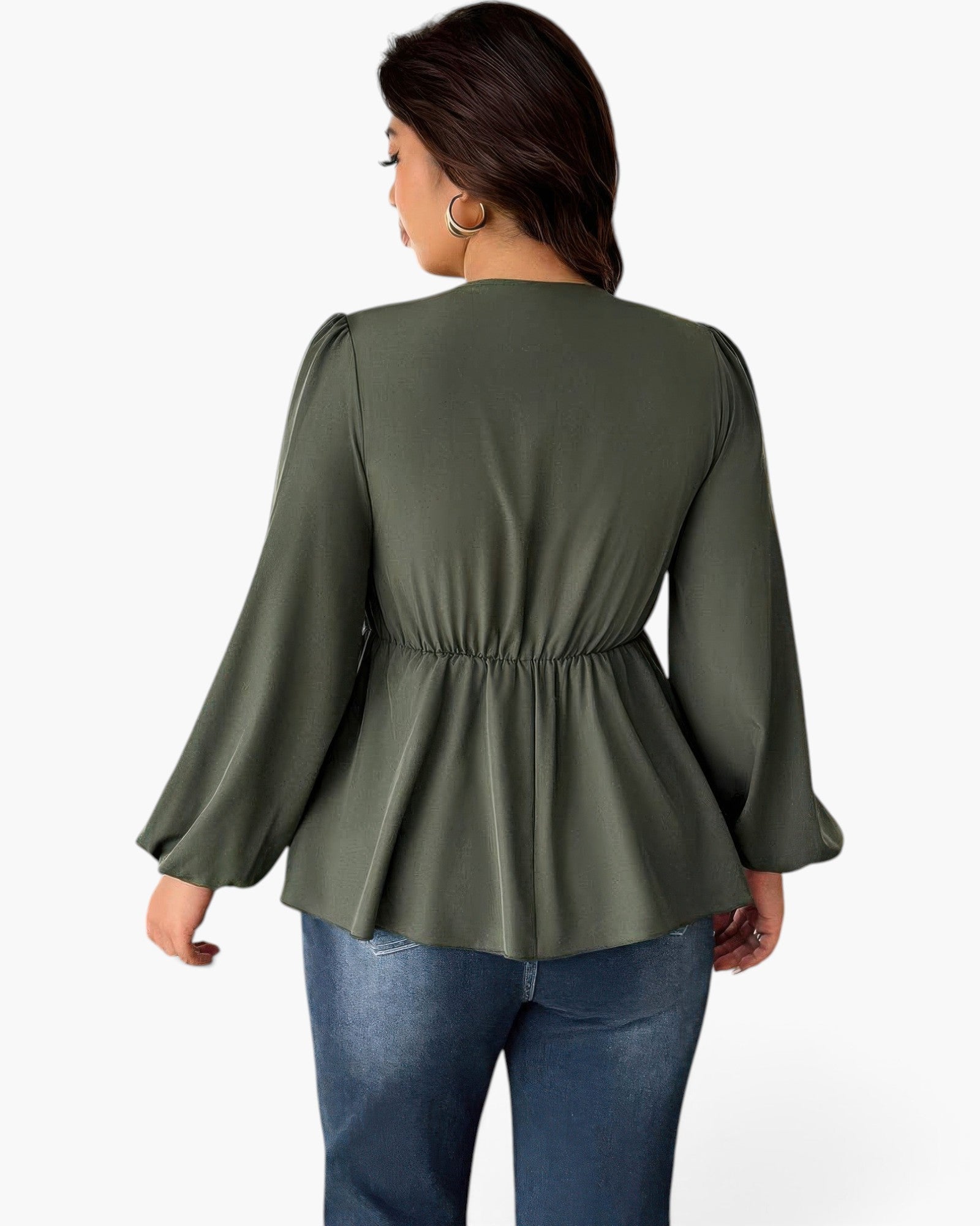 A woman shown from the back wearing an olive green long-sleeve peplum top with gathered detailing at the waist, paired with blue jeans, against a plain white background.