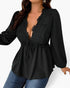 A woman wearing a black long-sleeve blouse with a deep V-neckline, lace-like ruffle trim, and a drawstring waist, paired with blue jeans against a plain light background.