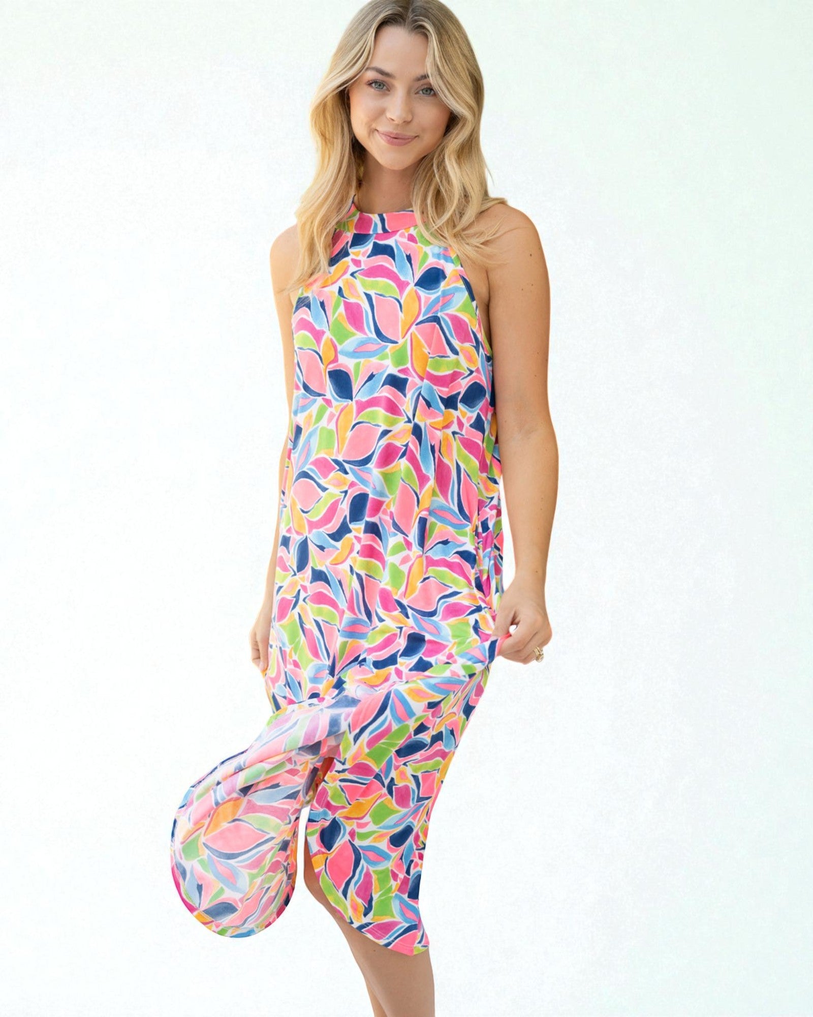 Woman wearing a colorful dress with a white background