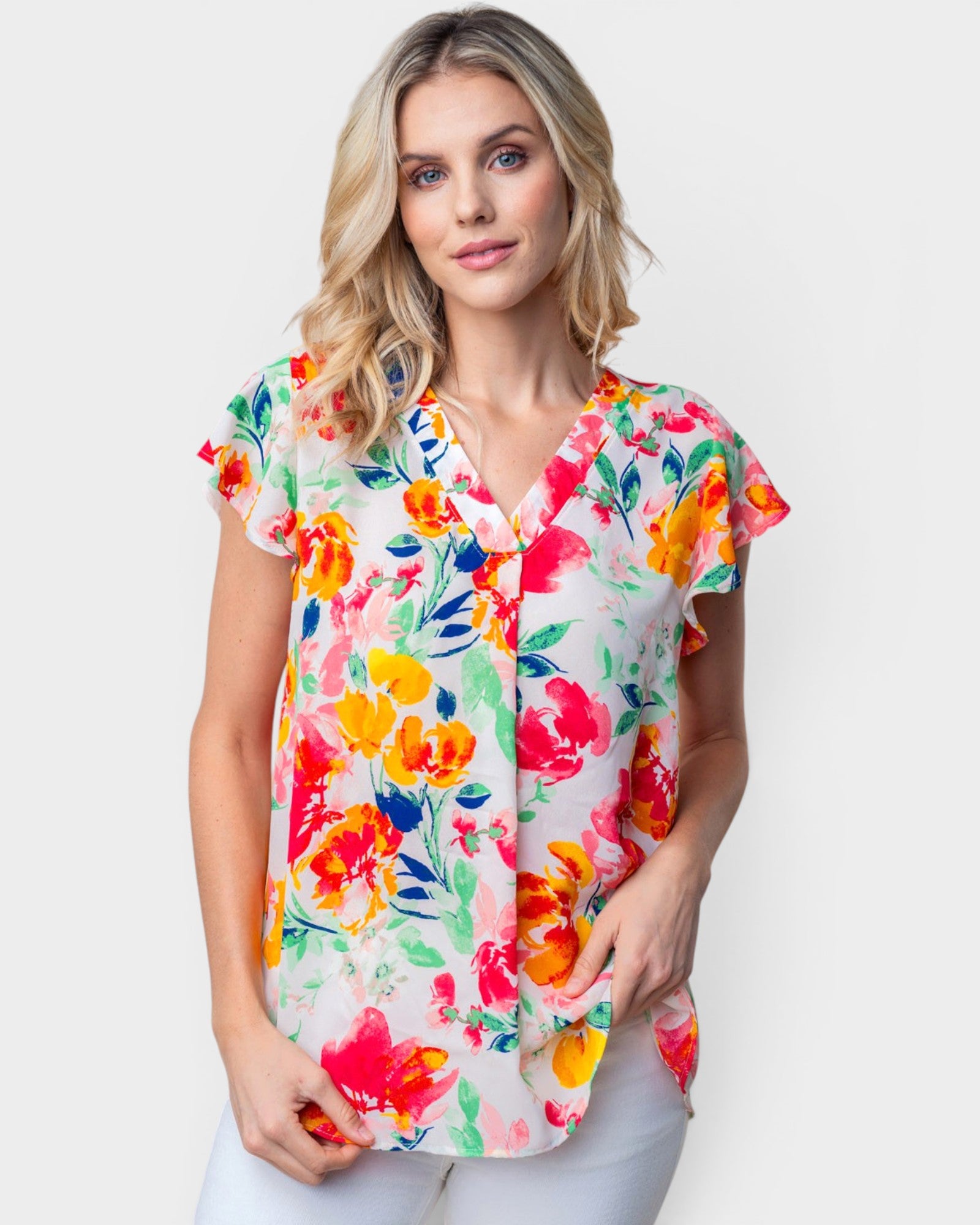 Blusa tejida con flores y mangas cortas en blanco y multicolor