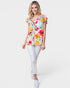 Blusa tejida con flores y mangas cortas en blanco y multicolor