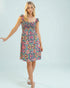 Woman wearing a floral dress on a light blue background