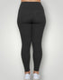 Black leggings worn by a person on a white background