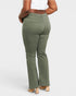 Person wearing olive green pants on a white background
