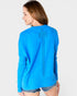 Woman wearing a blue sweater on a white background