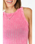 Close-up of a person wearing a pink striped tank top with a necklace.