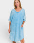 Woman wearing a light blue dress on a white background