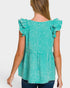 Woman wearing a teal checkered top with ruffled sleeves on a white background