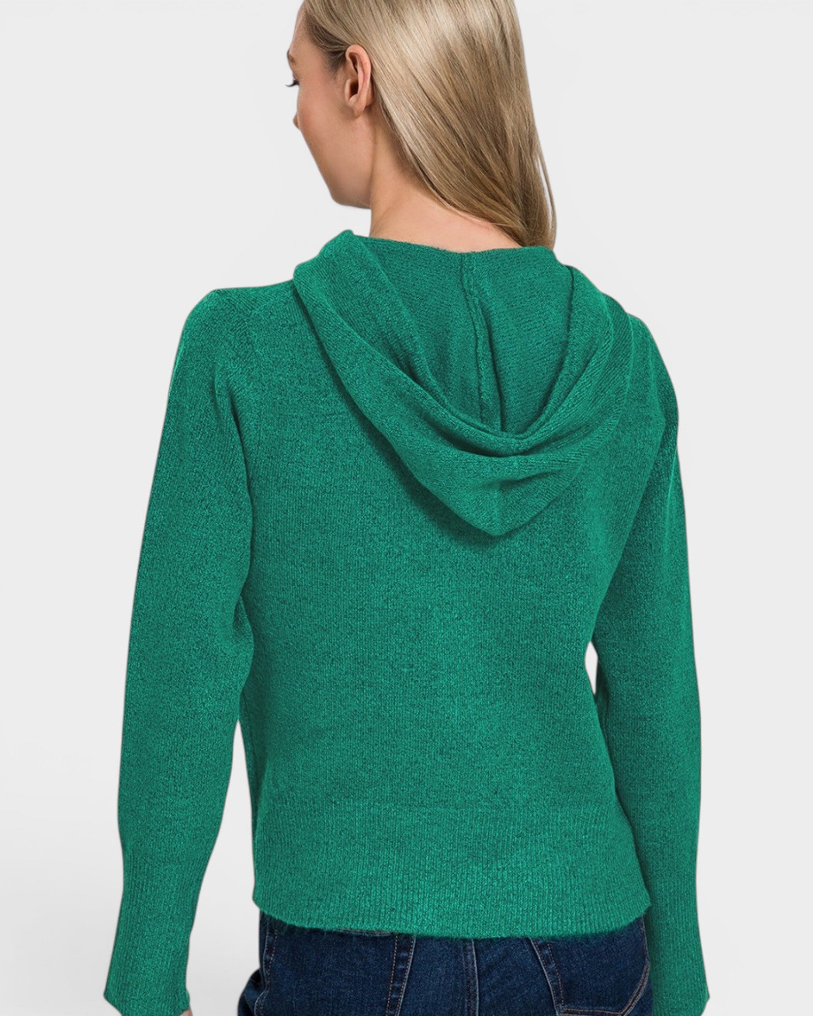 Green hoodie worn by a person on a white background