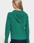 Green hoodie worn by a person on a white background