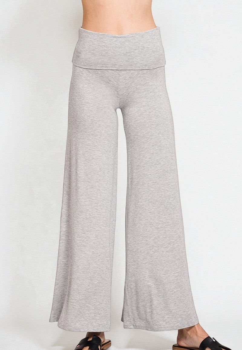 Gray wide-leg pants worn by a person on a white background