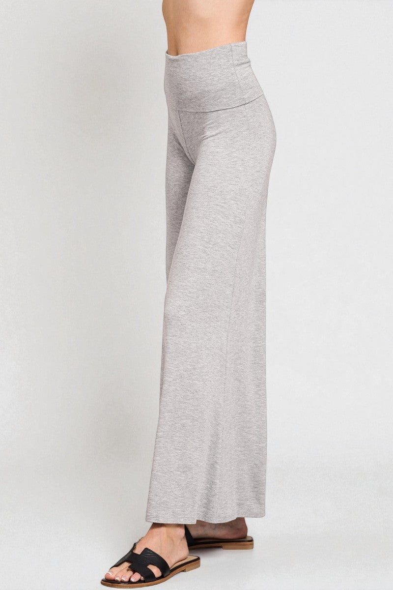 Gray wide-leg pants worn by a person on a white background