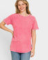 Woman wearing a pink t-shirt with a white background