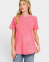 Woman wearing a pink t-shirt against a white background